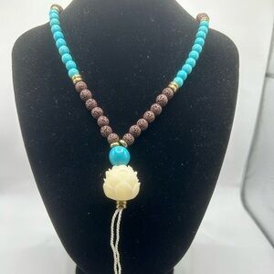 Elegant Turquoise and Brown Beaded Necklace